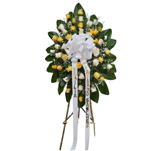 Corona fúnebre de rosas amarillas y blancas