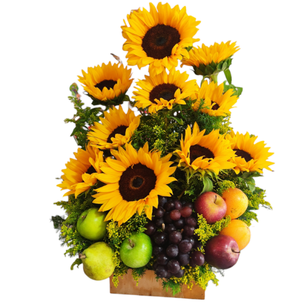 Frutero con 10 girasoles, solidago y frutas frescas como manzanas, uvas y naranjas.