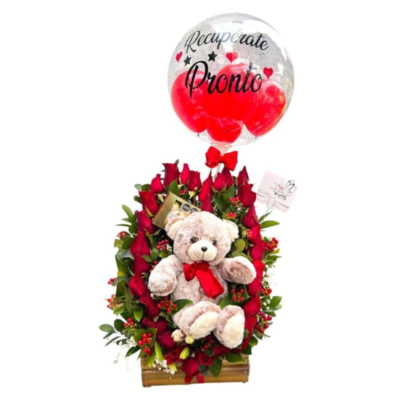 Arreglo en forma de corazón con rosas rojas, Ferrero, peluche y globo burbuja