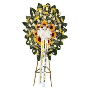Corona Fúnebre con Rosas Blancas, Crisantemos y Girasoles con Moño y Cinta